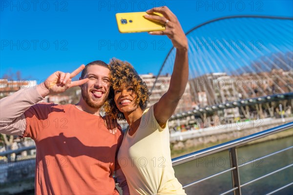 Multiracial couple through the city streets