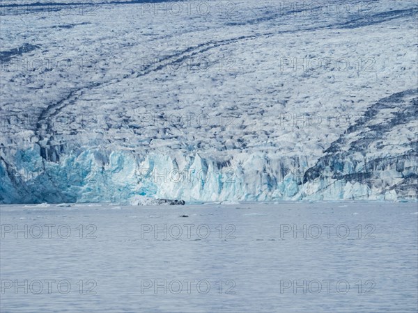 Glacier calving into Joekulsarlon Glacier Lagoon