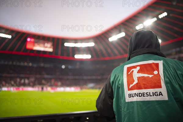 Cameraman with logo Bundesliga on TV camera