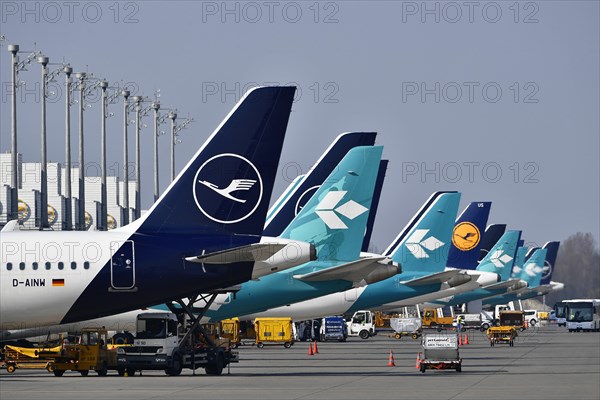 Lufthansa and Air Dolomiti aircraft parked in position at Terminal 2