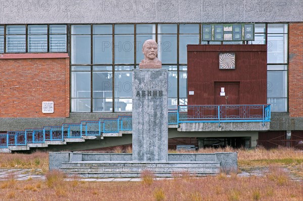 Statue of Lenin and sport and cultural centre at Pyramiden