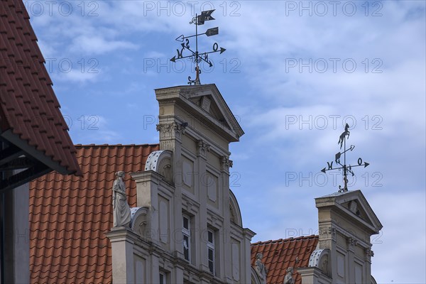Antique wind direction indicators on historic gables