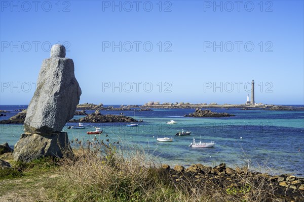 Statue of Victor Hugo Lhomme qui marche and the phare de lile Vierge