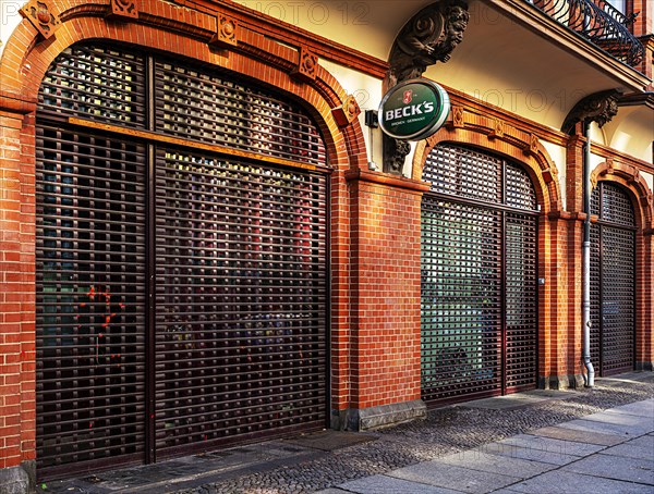 Rolling grilles on the commercial premises of a historic building