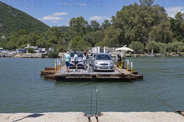 Cars on primitive cable ferry crossing the Vivari Channel near Butrint National Park