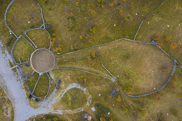 Aerial view over fences of Sami herders corral for trapping reindeer in autumn at Haerjedalen