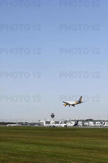Landing Condor Airbus A320 on runway south with tower