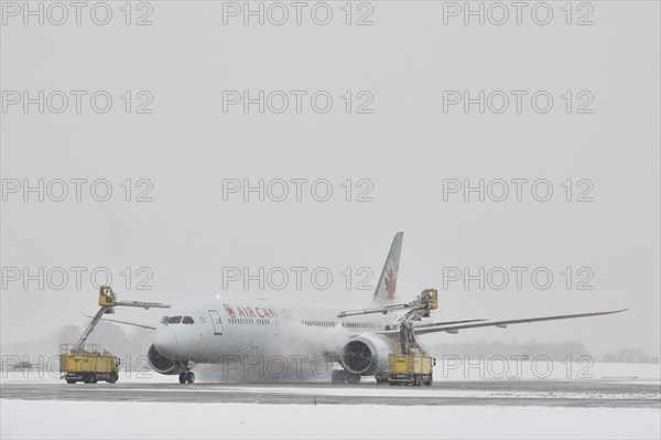 Aircraft deicing in winter in front of take-off