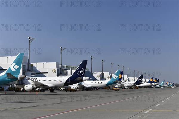 Lufthansa and Air Dolomiti aircraft parked in position at Terminal 2