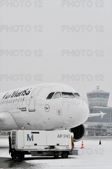 Snowed-in Lufthansa Airbus in winter