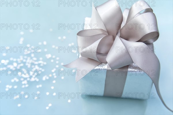 Silver gift box with satin bow