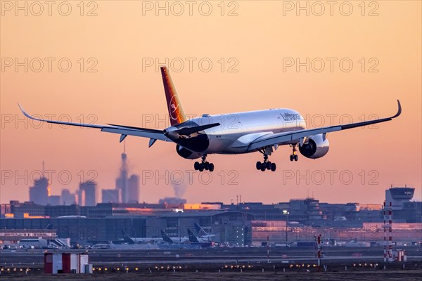 Fraport Airport with skyline in the early morning