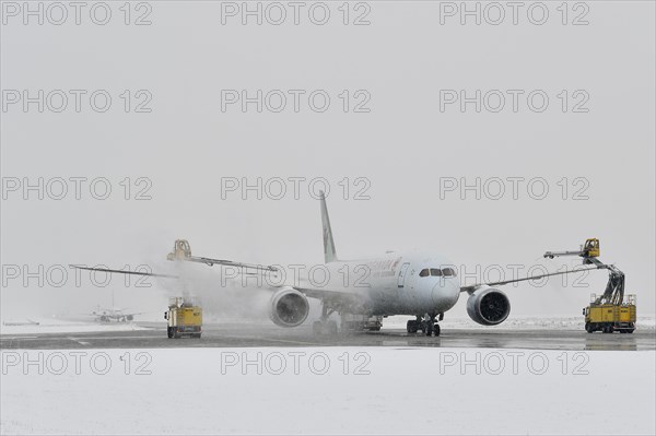 Aircraft deicing in winter in front of take-off