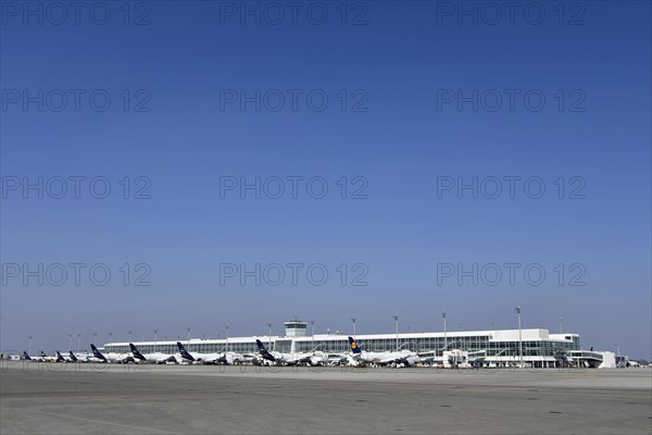 Lufthansa aircraft parked on position at satellite