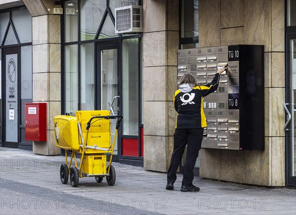 Deutsche Post postman for letter delivery