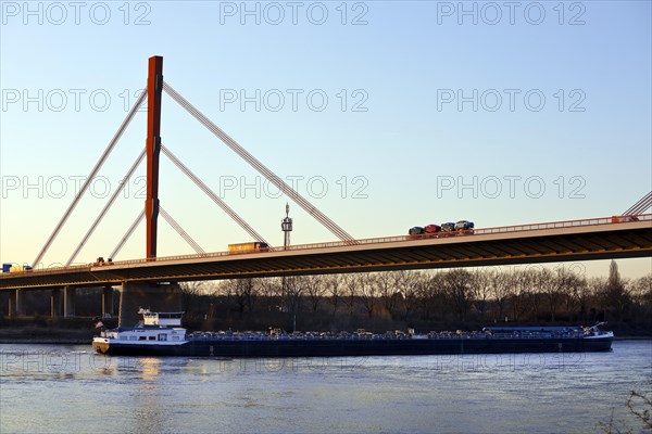 Ship traffic on the Rhine and motorway bridge A 42 with road traffic