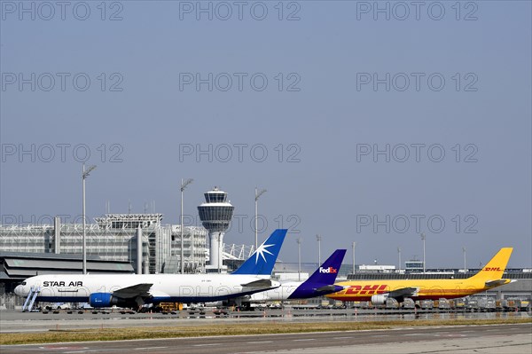 Cargo aircraft on position with tower