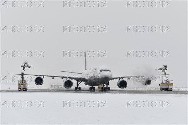 Aircraft deicing in winter in front of take-off