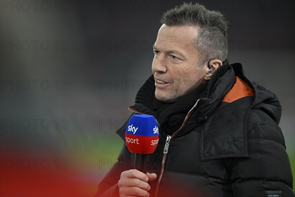 TV pundit Lothar Matthaeus in interview with microphone