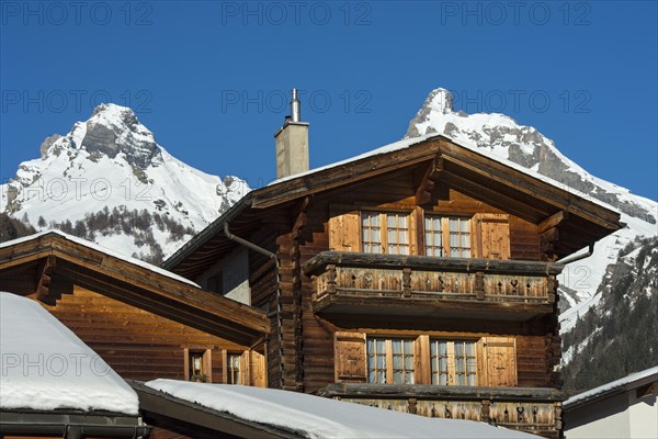 Typical Valais chalet in the wintry Swiss Alps