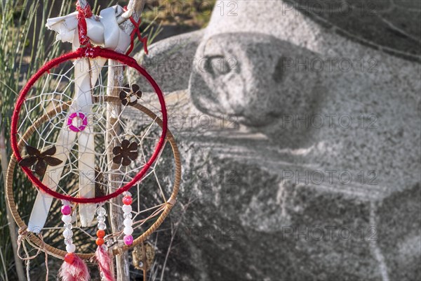 Dreamcatchers at granite turtle sculpture Scarlett