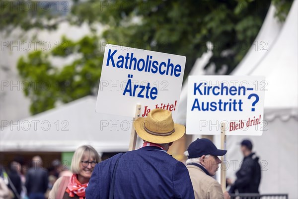 Critical posters against leaving the Catholic Church