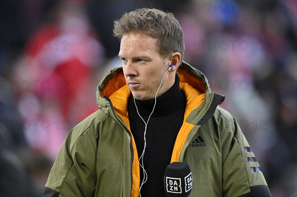 Coach Julian Nagelsmann interviewed by microphone