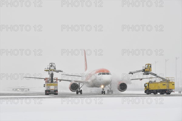 Aircraft de-icing in winter in front of take-off