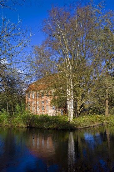 Schoenebeck Castle in Bremen Vegesack Water reflection and autumn atmosphere