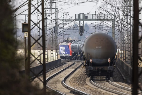 Goods train with tank wagon on the way