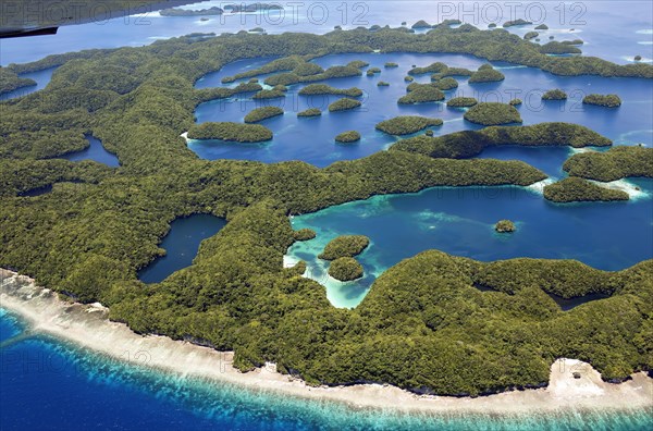 Aerial view Birds eye view of small tropical archipelago many small tropical green overgrown islands