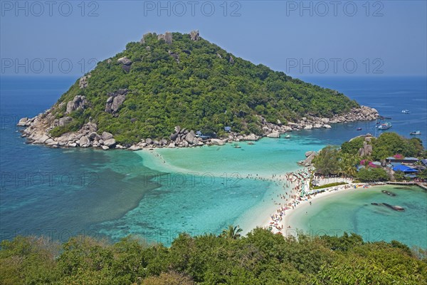 Western tourists sunbathing on beach of Ko Nang Yuan