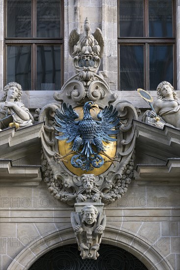 Imperial eagle and sculptures at the central entrance portal of the historic Wolf Town Hall