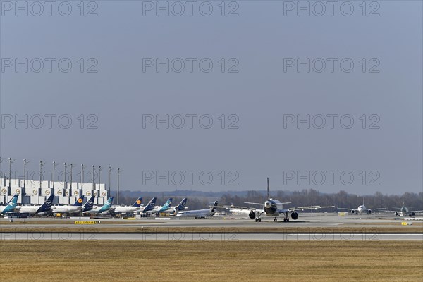 Overview Apron East with Lufthansa and Air Dolomiti aircraft at the satellite and Terminal 2