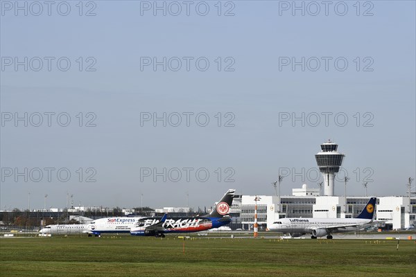 SUNEXPRESS BOEING 737-800 special livery football club Eintracht Frankfurt taking off on runway south with Lufthansa aircraft