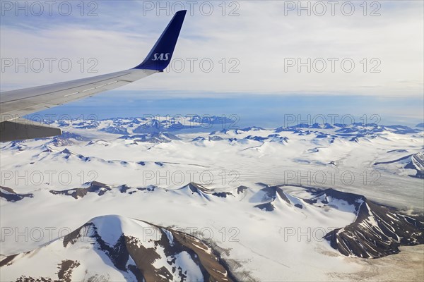 Aerial view from airplane of mountainous landscape of Spitsbergen