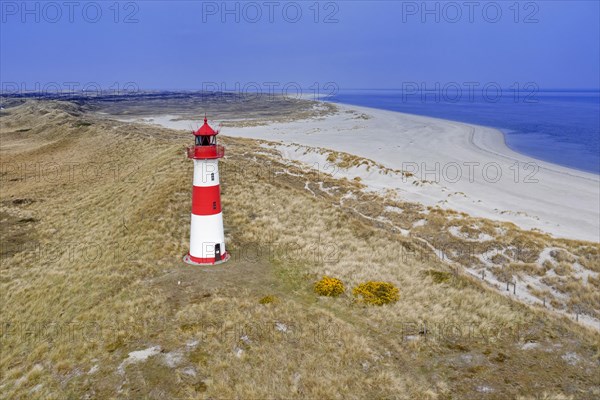 Red and white striped lighthouse List East