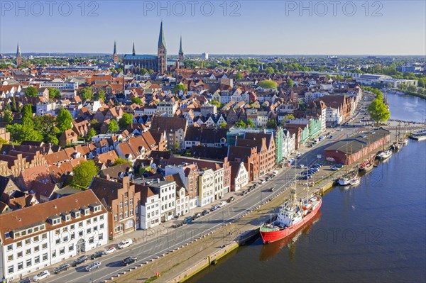 Aerial view over the river Trave and Feuerschiff Fehmarnbelt Lightship in the old town of the Hanseatic City of Luebeck