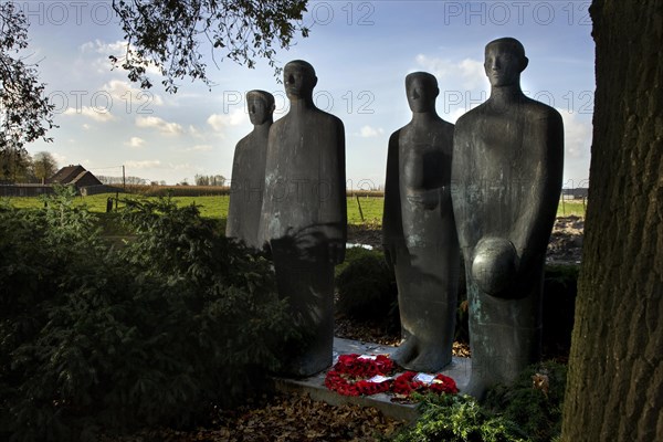 Sculpture group Trauernde Soldaten at the Langemark German World war One cemetery Alter Friedhof