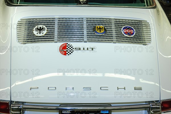 Radiator grille with historic badge in bonnet of historic Porsche 911T 911 T