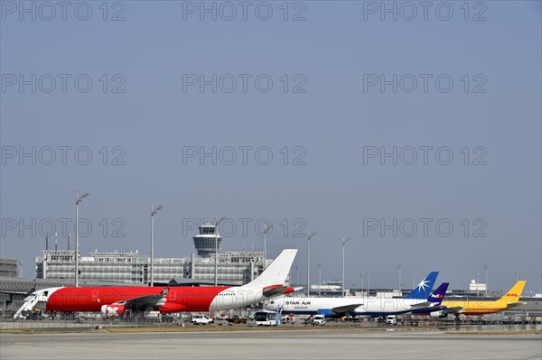 Cargo aircraft on position with tower