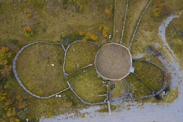 Aerial view over fences of Sami herders corral for trapping reindeer in autumn at Haerjedalen