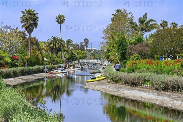 Rowing boats on the banks of one of many canals at seaside resort Venice