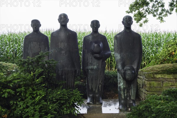 Sculpture group Trauernde Soldaten by Emil Krieger at the First World War One military cemetery Deutscher Soldatenfriedhof Langemark