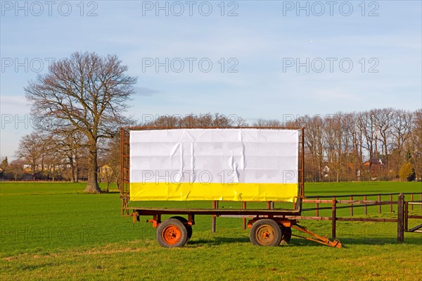 Advertising plan on an agricultural trailer