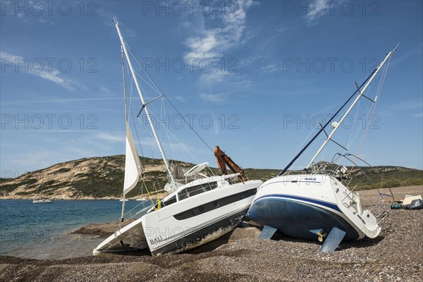 Luxury yachts stranded after a storm