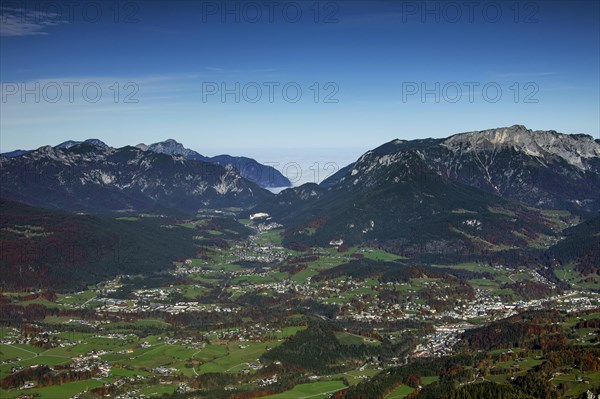 Aerial view from Mount Jenner over the village Schoenau and Mount Untersberg in autumn