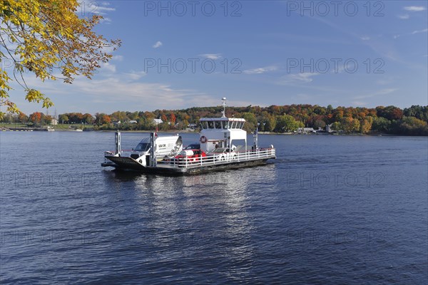 Small ferry boat crossing the Ottawa River