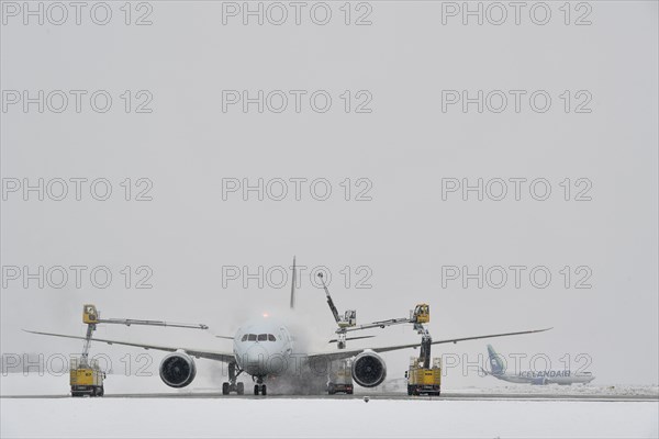 Aircraft deicing in winter in front of take-off