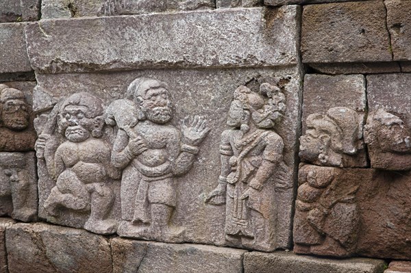 Relief on stone wall at Candi Sukuh